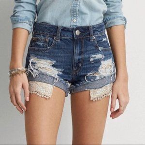 ripped jean shorts with pockets hanging out